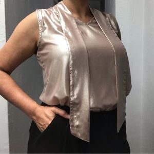 A love story brand top. Size medium. Color champagne.